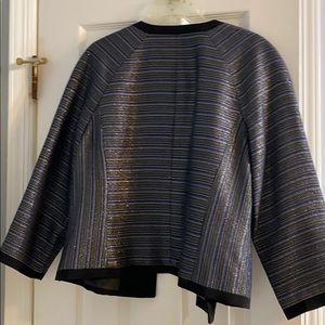 Beautiful Blazer with sparkly thread throughout .